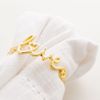 Conjunto-4-Aneis-para-Guardanapos-de-Zinco-e-Metal-Love-Dourado-4cm-x-2cm-x-4cm-Wolff